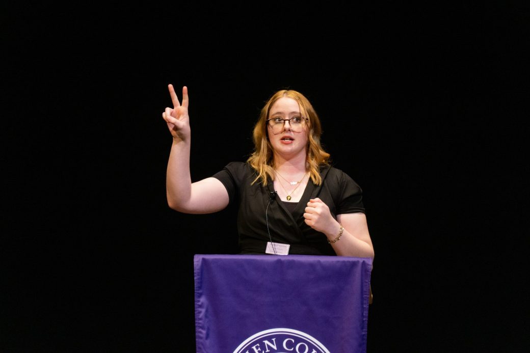 Woman speaking in a pulpit