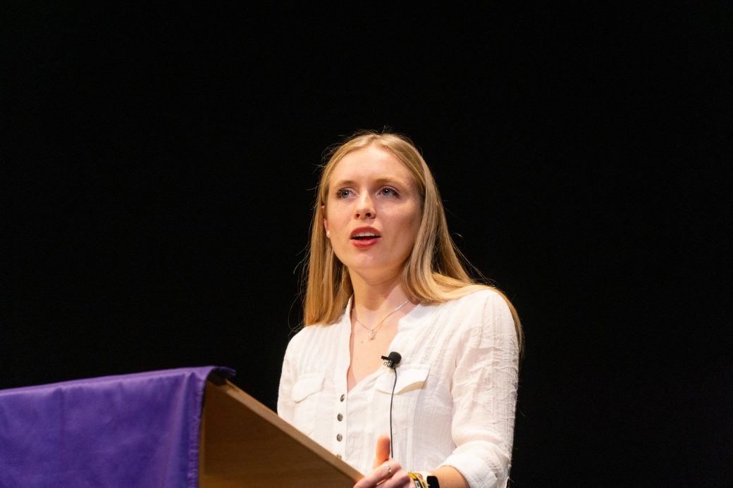 Woman speaking in a pulpit