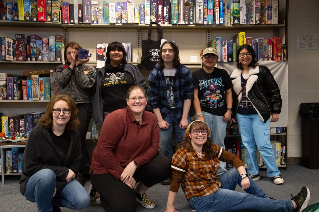 People smiling and stricking a pose to the camera