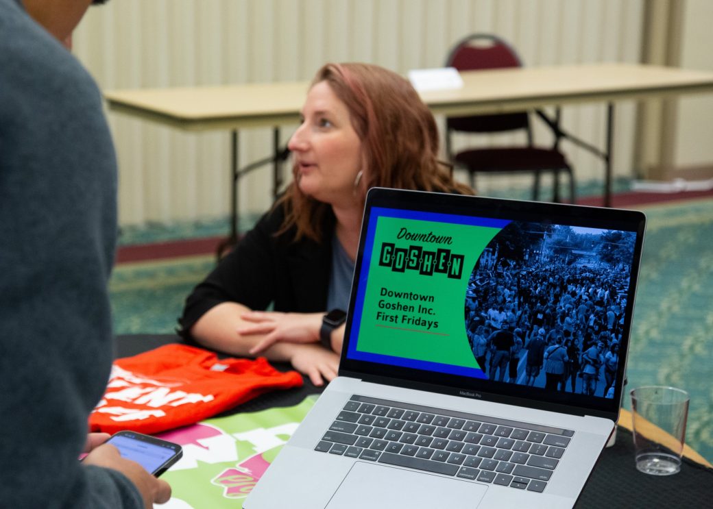 Woman doin g a presentation at Community Engagement Fair 2024