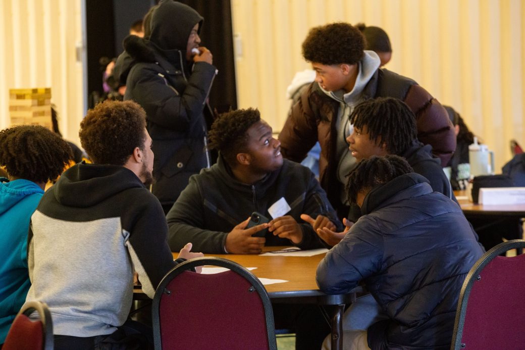 People talking at African American Spring Open House 2024