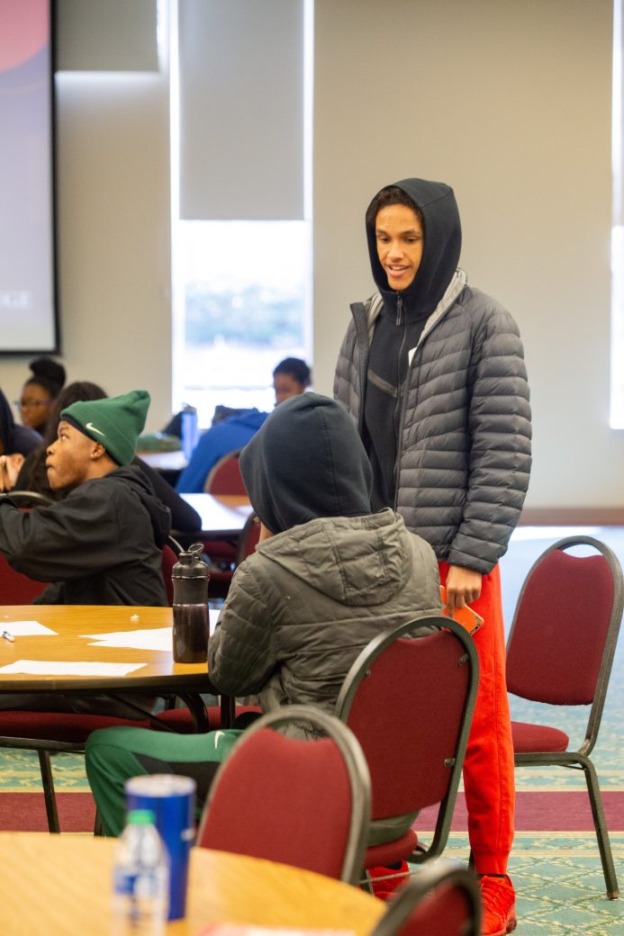 Man standing up at African American Spring Open House 2024