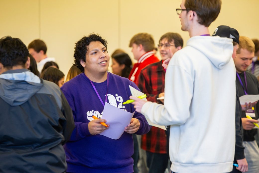 Two men talking at Goshen college