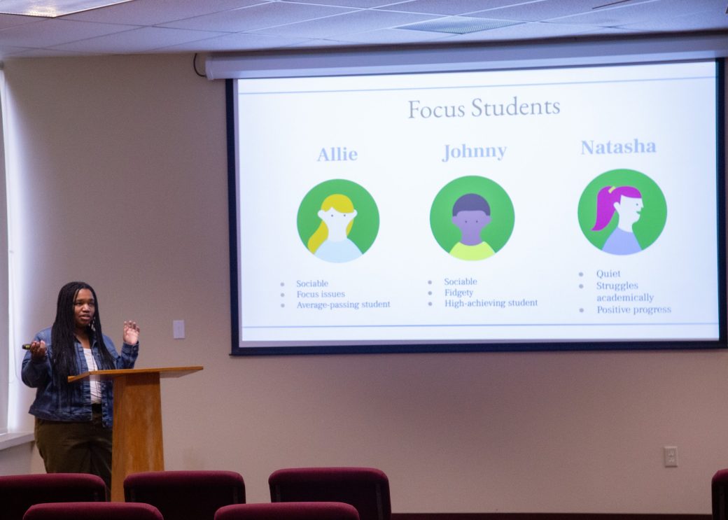 Woman doing a presentantion at Academic Symposium 2024