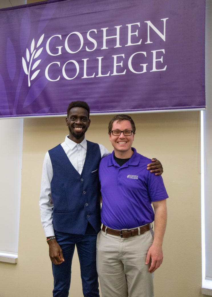 Two men hugging at President's Graduating Leaders Awards 2024