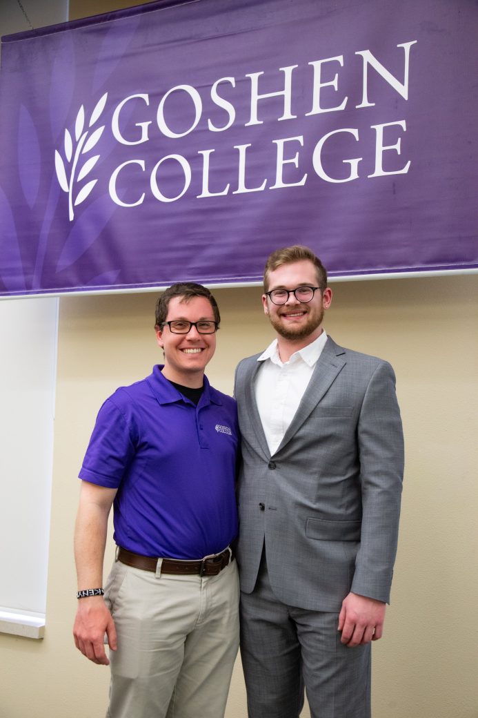 To men hugging at President's Graduating Leaders Awards 2024