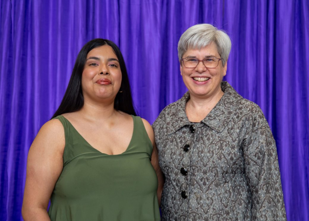 Two women hugging at President's Graduating Leaders Awards 2024