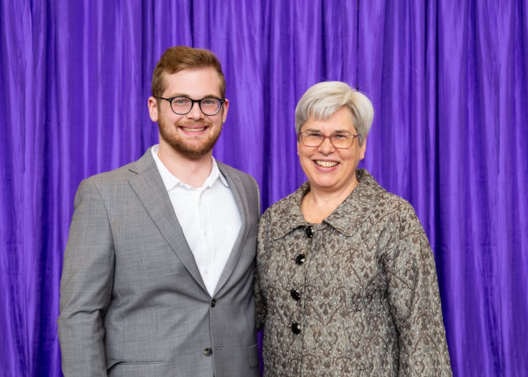 A women and a man hugging at President's Graduating Leaders Awards 2024