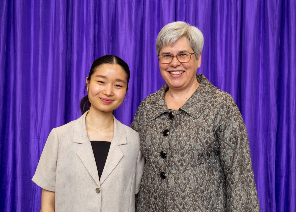 Two women hugging at President's Graduating Leaders Awards 2024