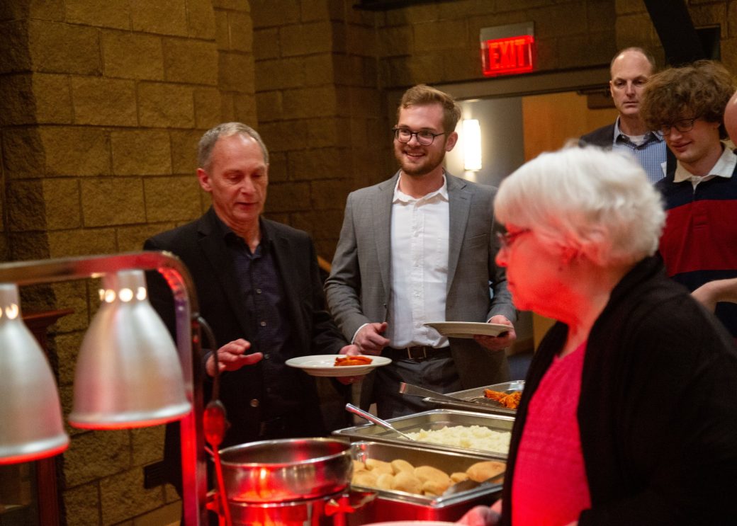People serving themselves at President's Graduating Leaders Awards 2024