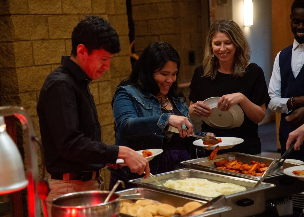 People serving themselves at President's Graduating Leaders Awards 2024