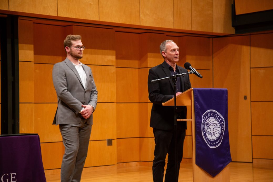 Man speaking at stage's pulpit at President's Graduating Leaders Awards 2024