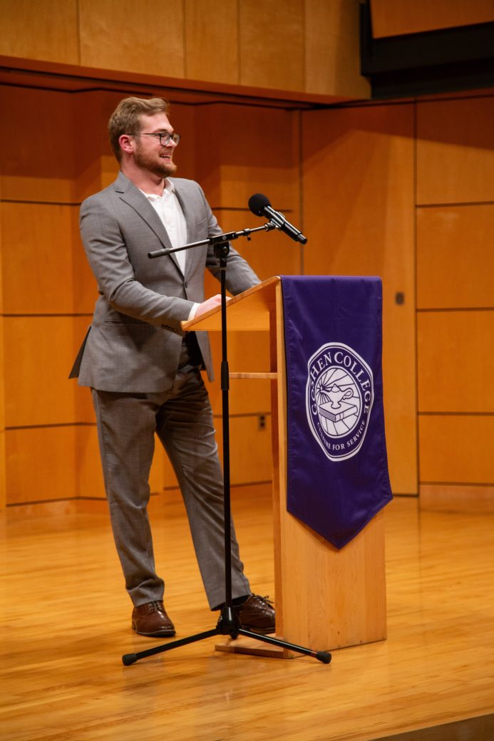 Man speaking at stage's pulpit at President's Graduating Leaders Awards 2024
