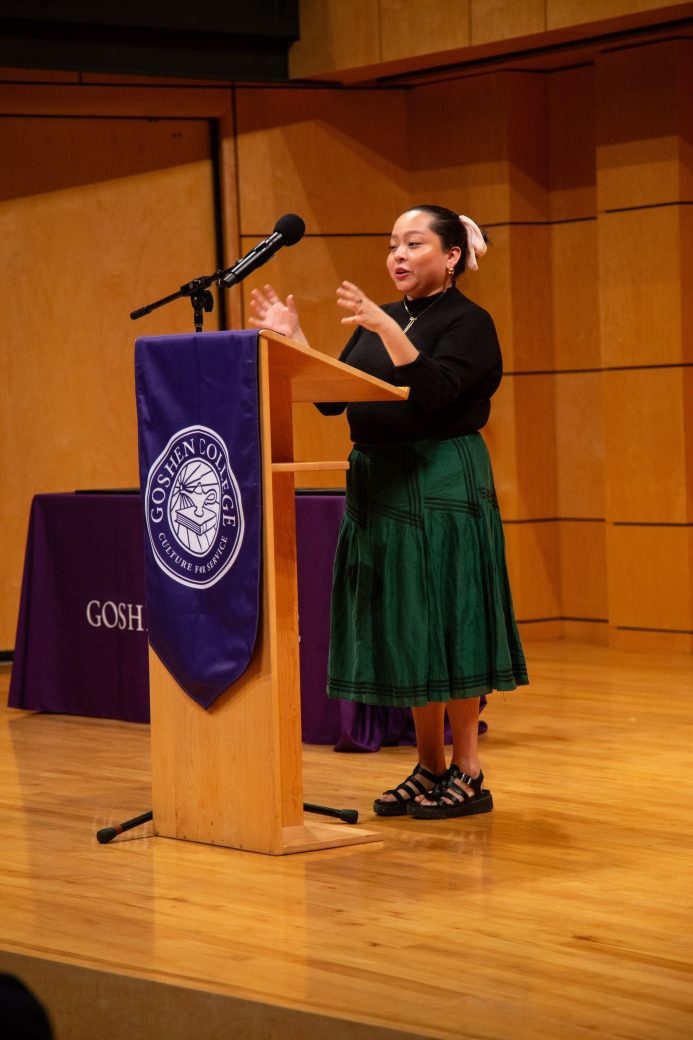 Woman speaking at stage's pulpit at President's Graduating Leaders Awards 2024