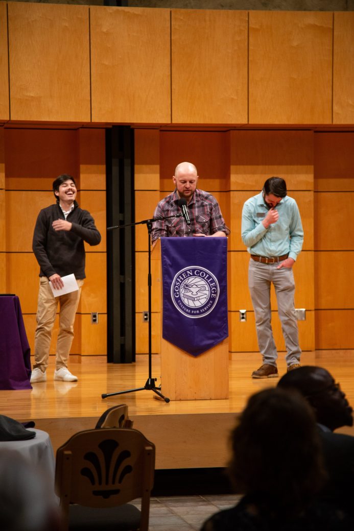 Man speaking at stage's pulpit at President's Graduating Leaders Awards 2024
