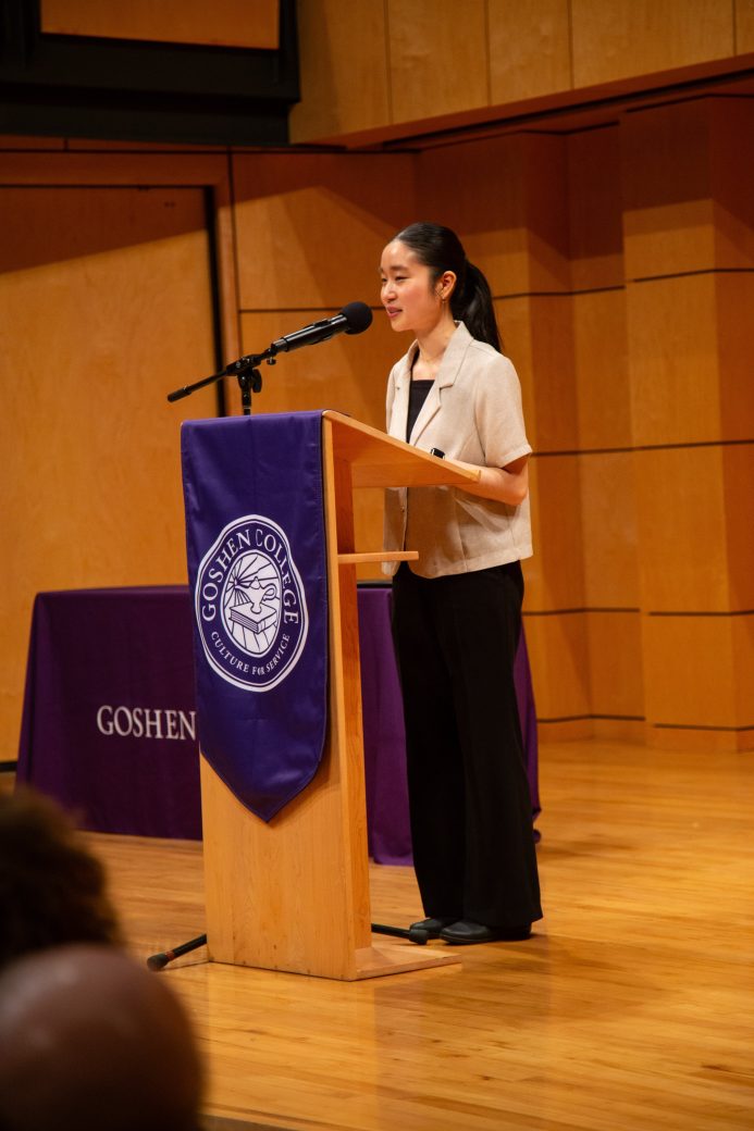 woman speaking at stage's pulpit at President's Graduating Leaders Awards 2024