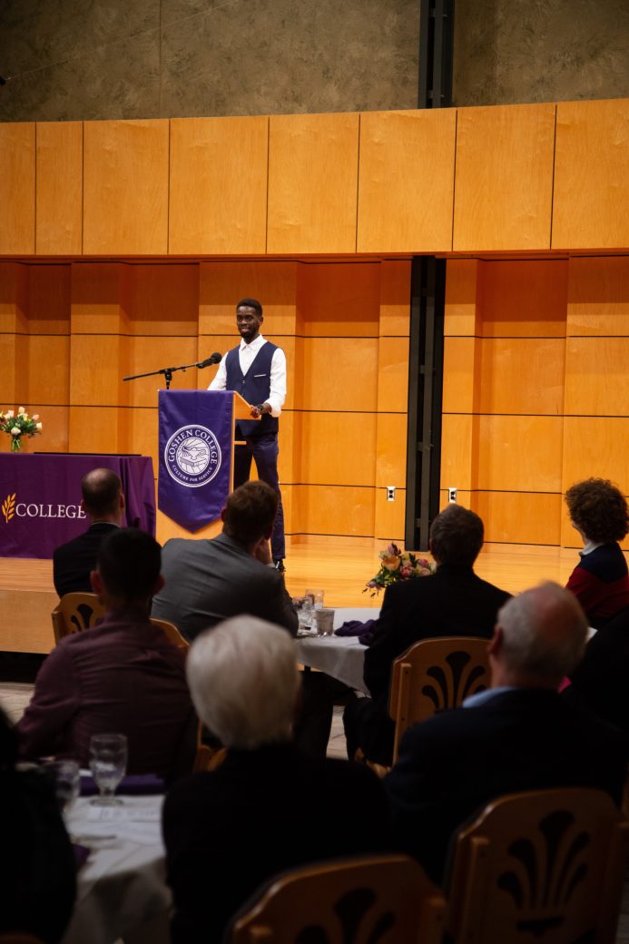 Man speaking at stage's pulpit at President's Graduating Leaders Awards 2024