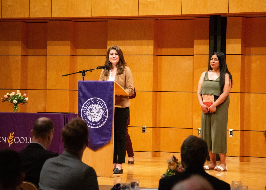 Woman speaking at stage's pulpit at President's Graduating Leaders Awards 2024