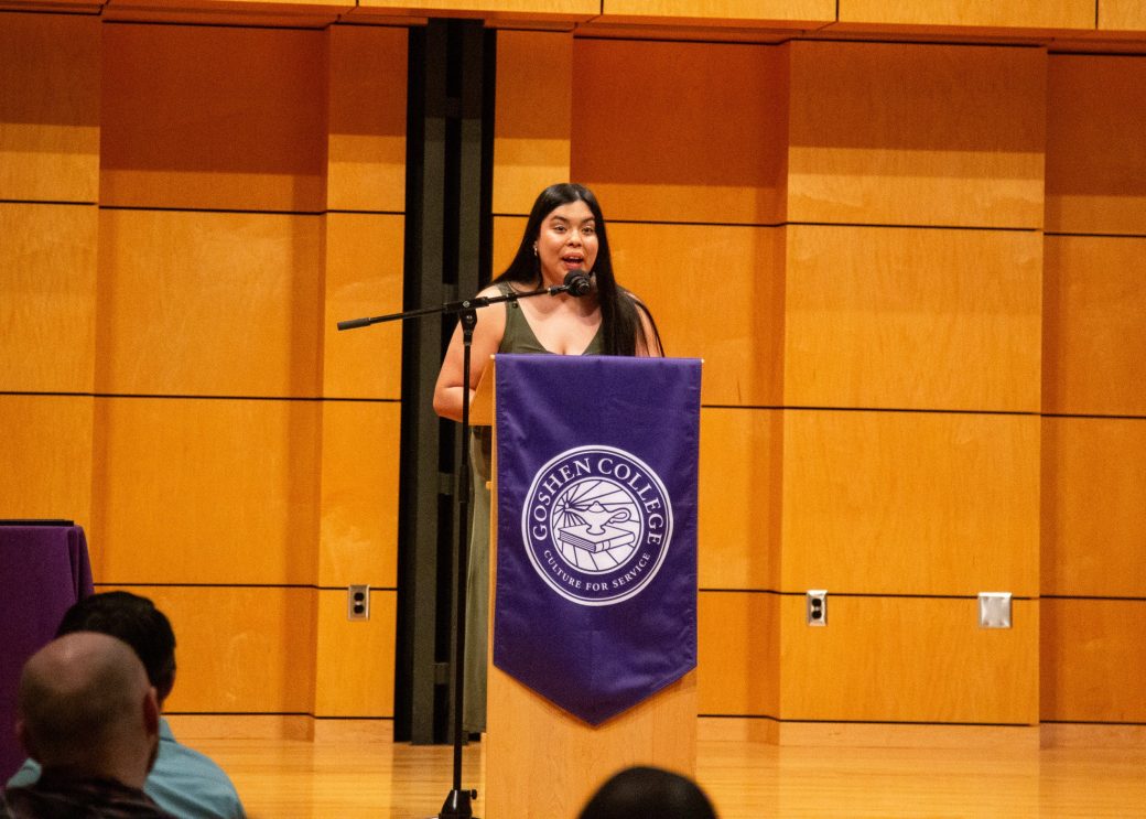 Woman speaking at stage's pulpit at President's Graduating Leaders Awards 2024