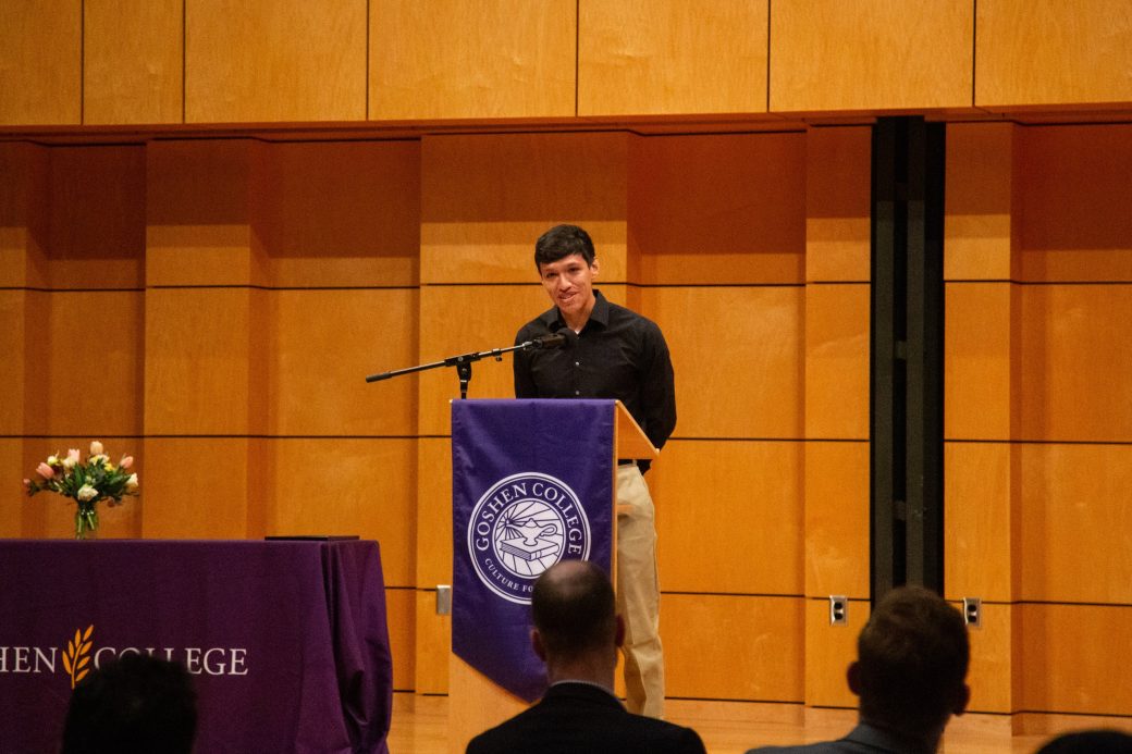 Man speaking at stage's pulpit at President's Graduating Leaders Awards 2024