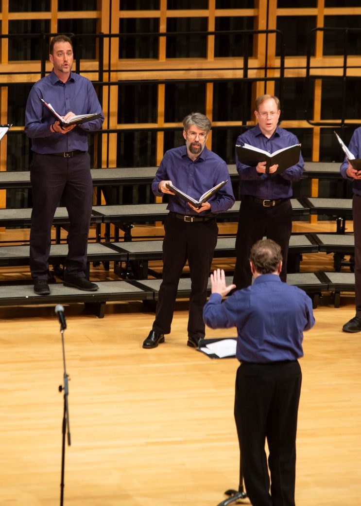 Members of the music choir singing at low voice festival