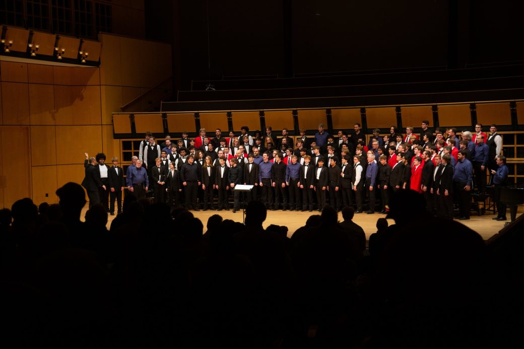 All music choirs singing together at low voice festival