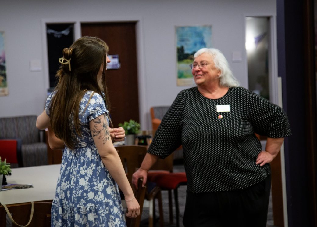 Two women talking at Academic Department Receptions and Baccalaureate Celebration