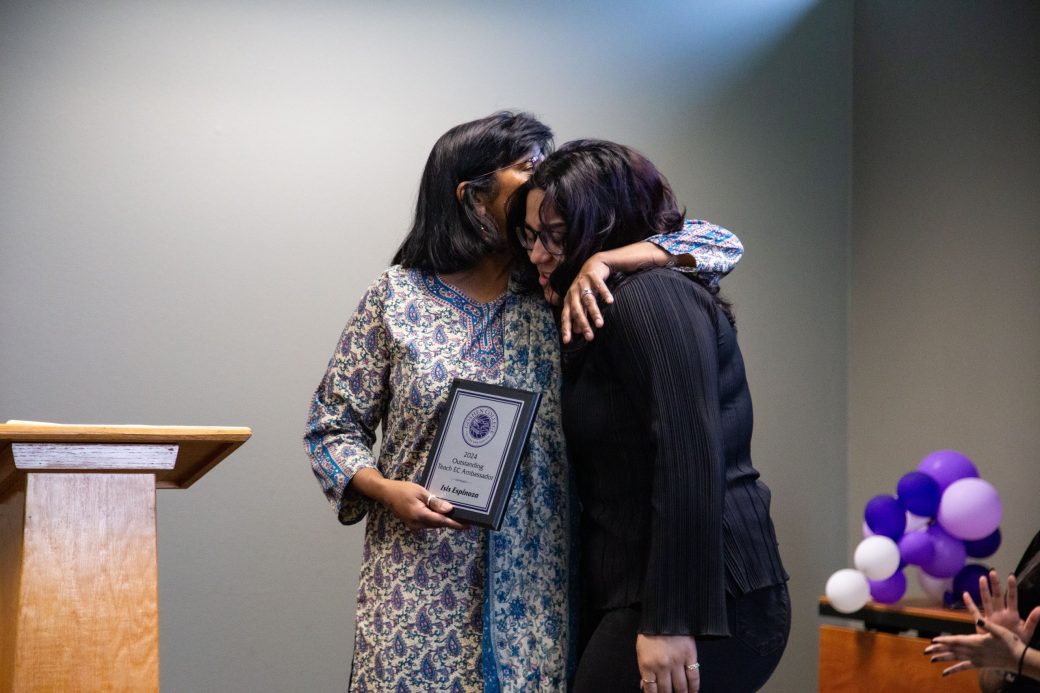 Two women hugging at Academic Department Receptions and Baccalaureate Celebration
