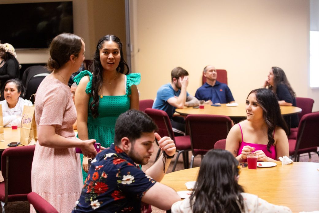 People talking at Academic Department Receptions and Baccalaureate Celebration