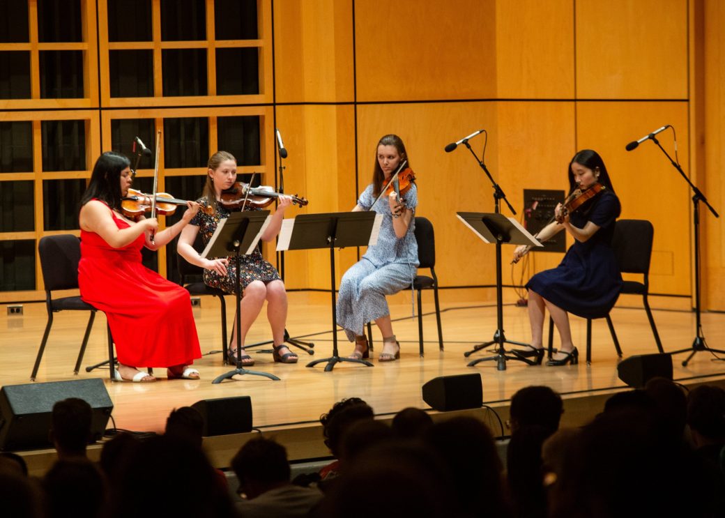 People playing violinis at Academic Department Receptions and Baccalaureate Celebration