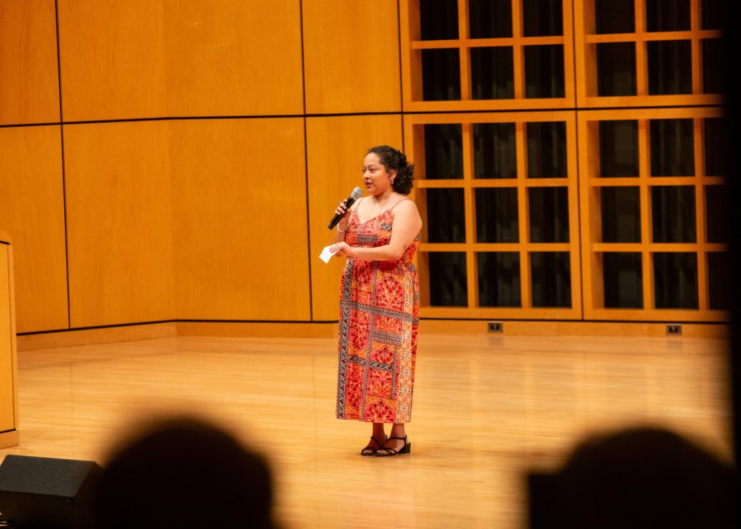 Woman doing a musical performance at Academic Department Receptions and Baccalaureate Celebration