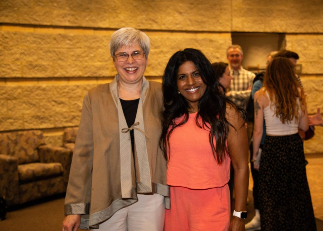 Two women hugging at Academic Department Receptions and Baccalaureate Celebration