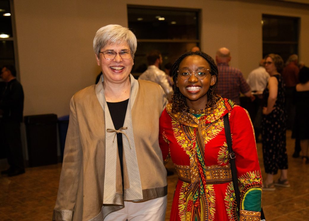 Two women hugging at Academic Department Receptions and Baccalaureate Celebration