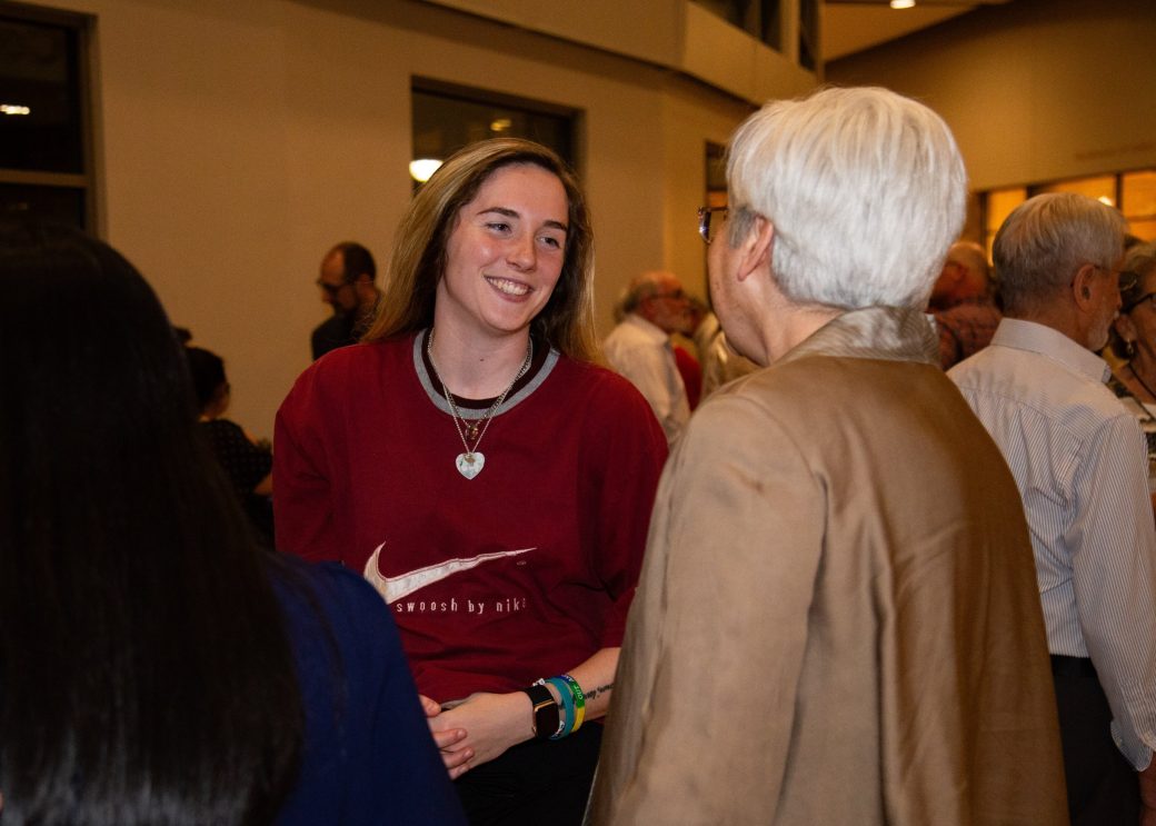 Two women talking at Academic Department Receptions and Baccalaureate Celebration