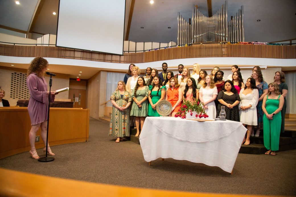 Woman doing having a speech at Commencement 2024: Nurses' Pinning Ceremony