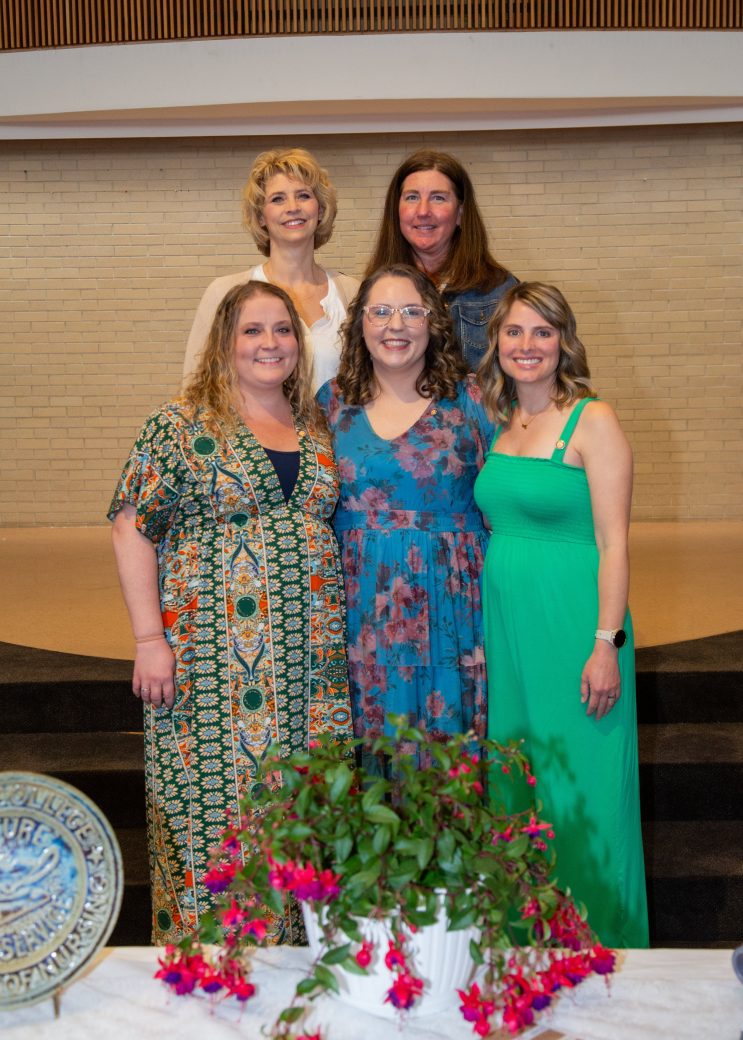 Three womans hugging at Commencement 2024: Nurses' Pinning Ceremony