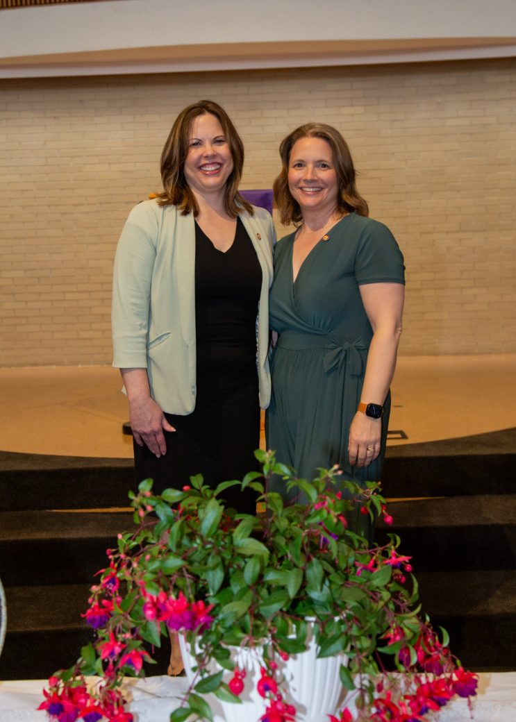 Two women hugging at Commencement 2024: Nurses' Pinning Ceremony