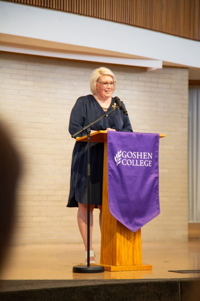 Woman doing a speech at Commencement 2024: Nurses' Pinning Ceremony