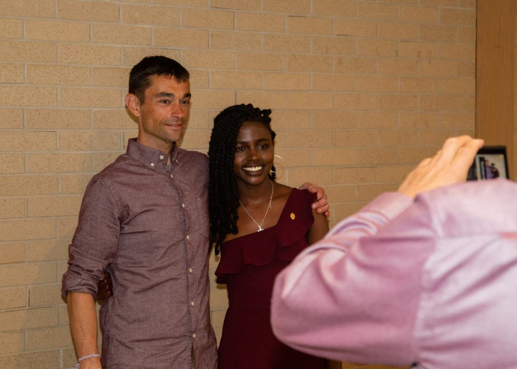 A man and a woman hugging at Commencement 2024: Nurses' Pinning Ceremony