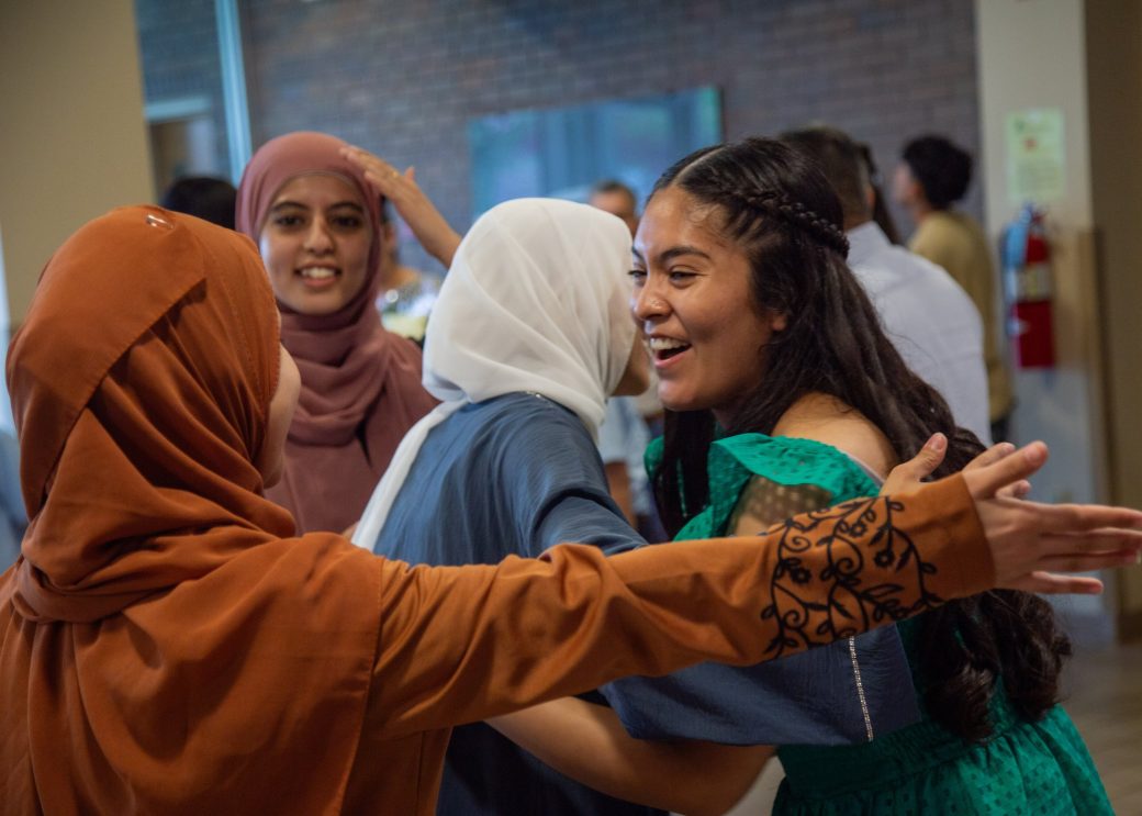 People hugging at Commencement 2024: Nurses' Pinning Ceremony