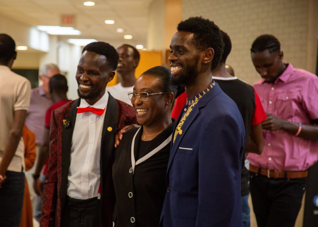 People smiling to the camera at Commencement 2024: Nurses' Pinning Ceremony