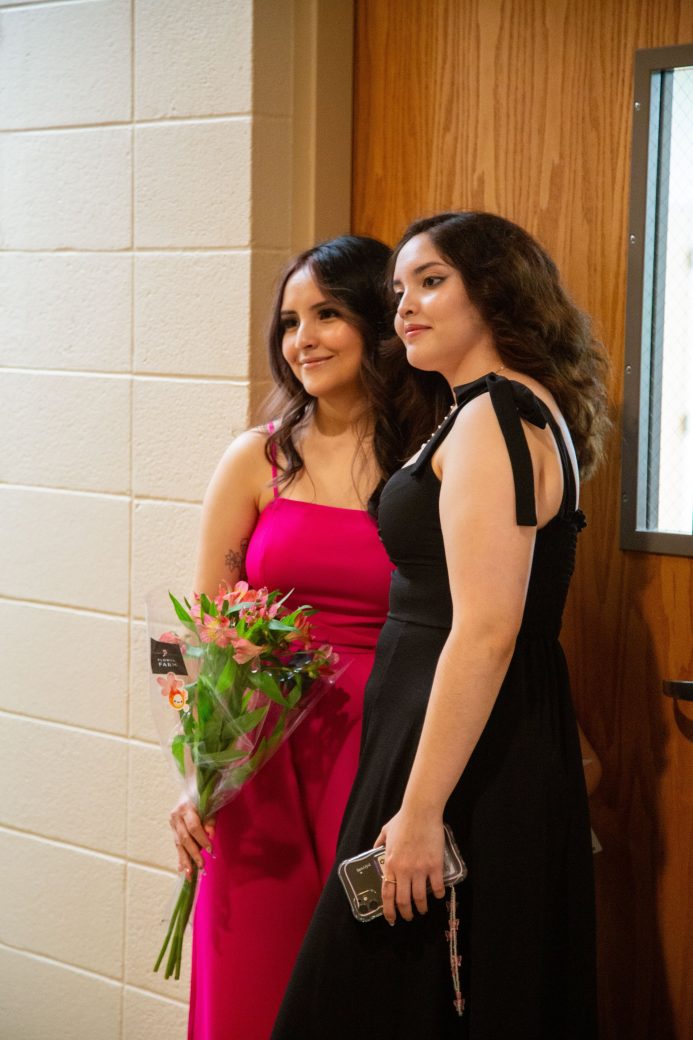 Two women hugging at Commencement 2024: Nurses' Pinning Ceremony