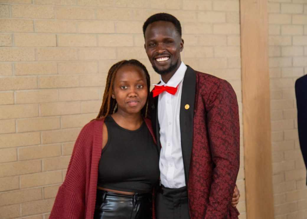 A man and a woman hugging at Commencement 2024: Nurses' Pinning Ceremony