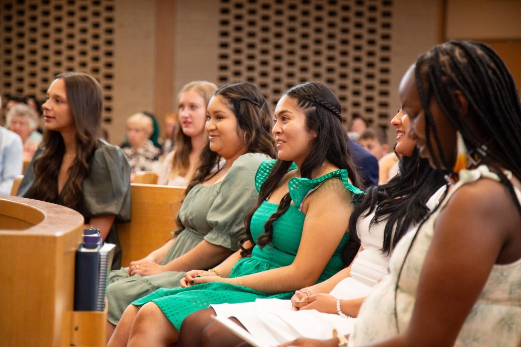People paying attention at Commencement 2024: Nurses' Pinning Ceremony