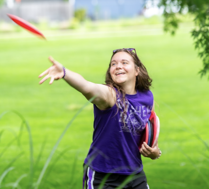 Student of the goshen college throwing a disc