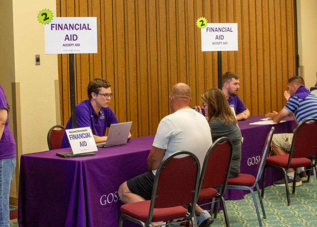 People in a financial aid reception at Goshen college