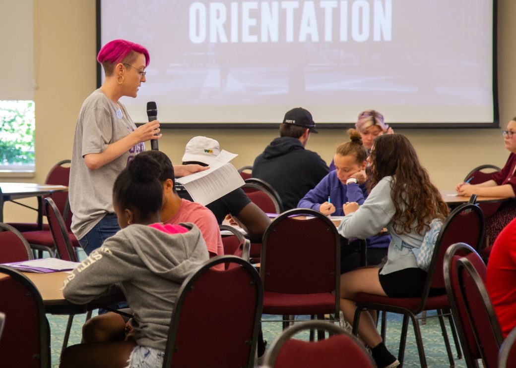 Woman speaking at New Student Orientation 2024