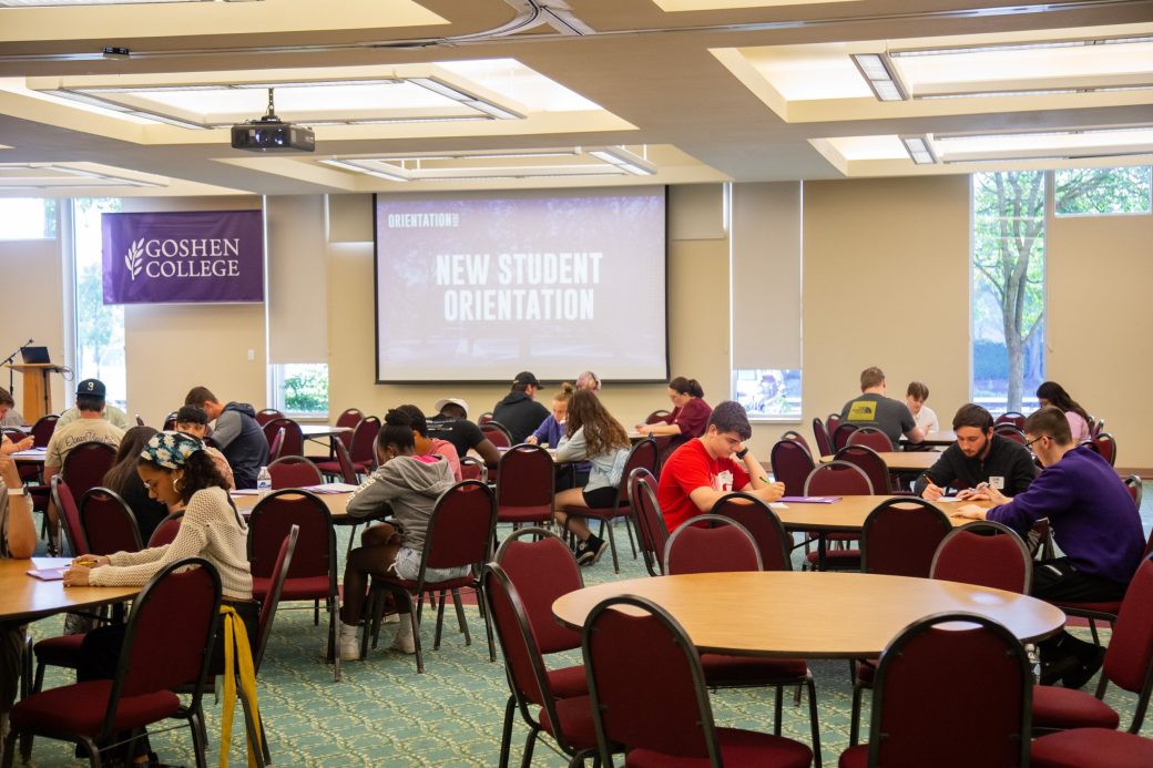 Goshen college students paying attention in a presentation