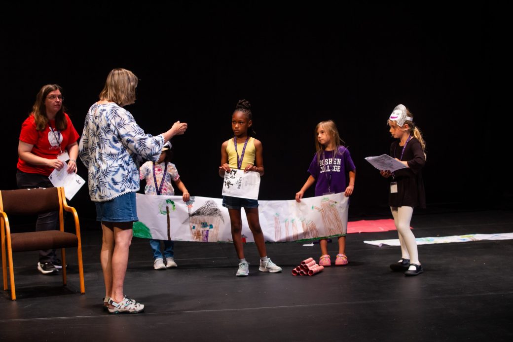Teens showing their draw