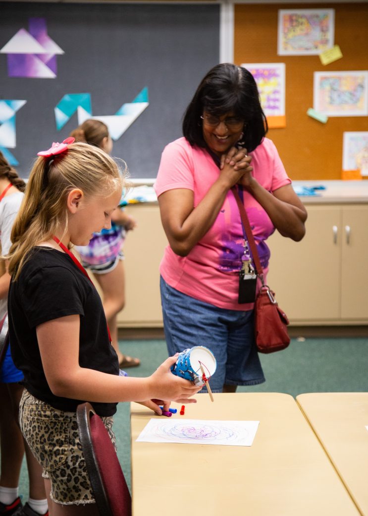 Young teen doing a draw at summer camp